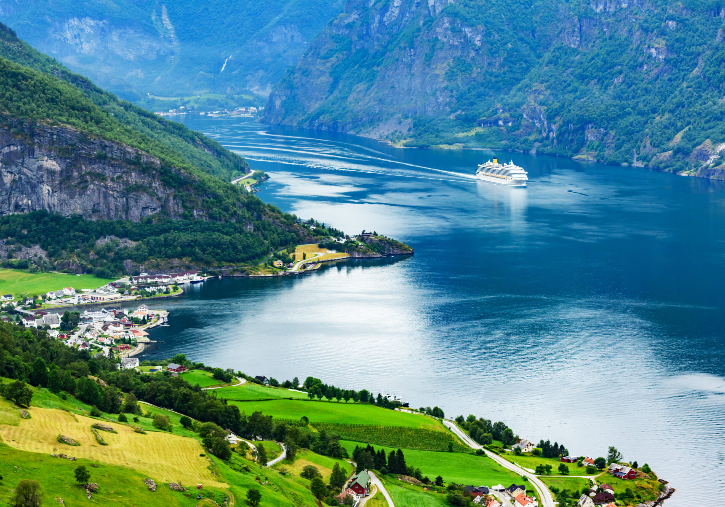 Breathtaking view of Sunnylvsfjorden fjord and cruise ship, near Geiranger village in western Norway. Landscape photography